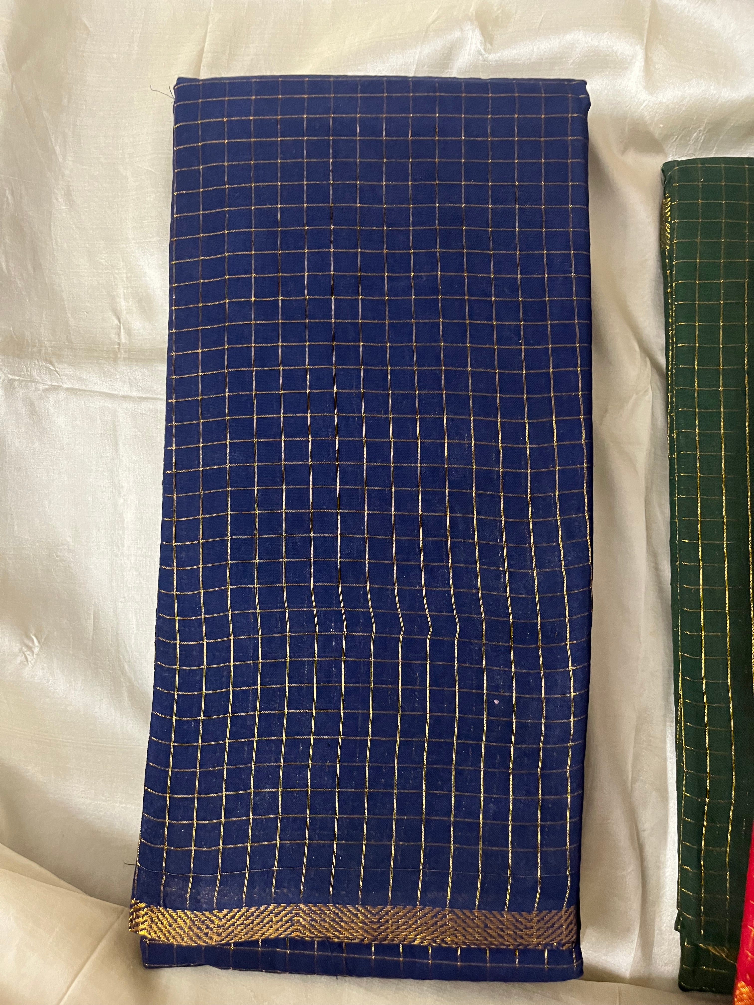 Zari checked Blue Saree with running blouse
